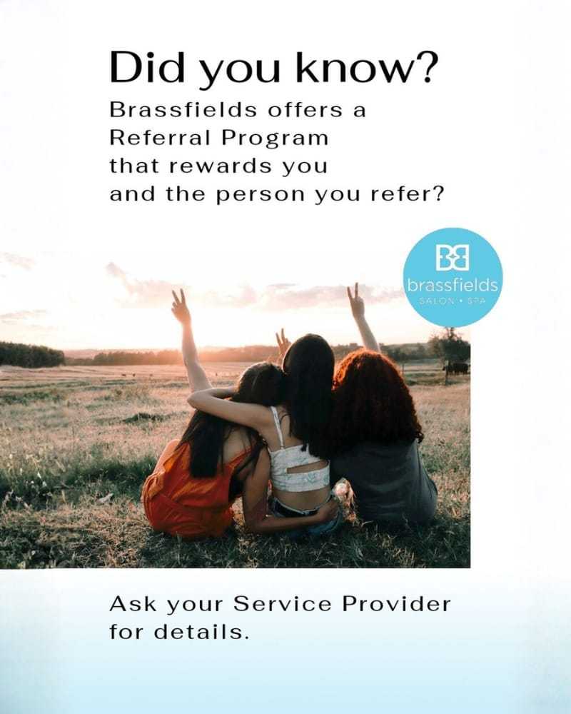 Brassfields salon referral program ad with three people in a field at sunset.