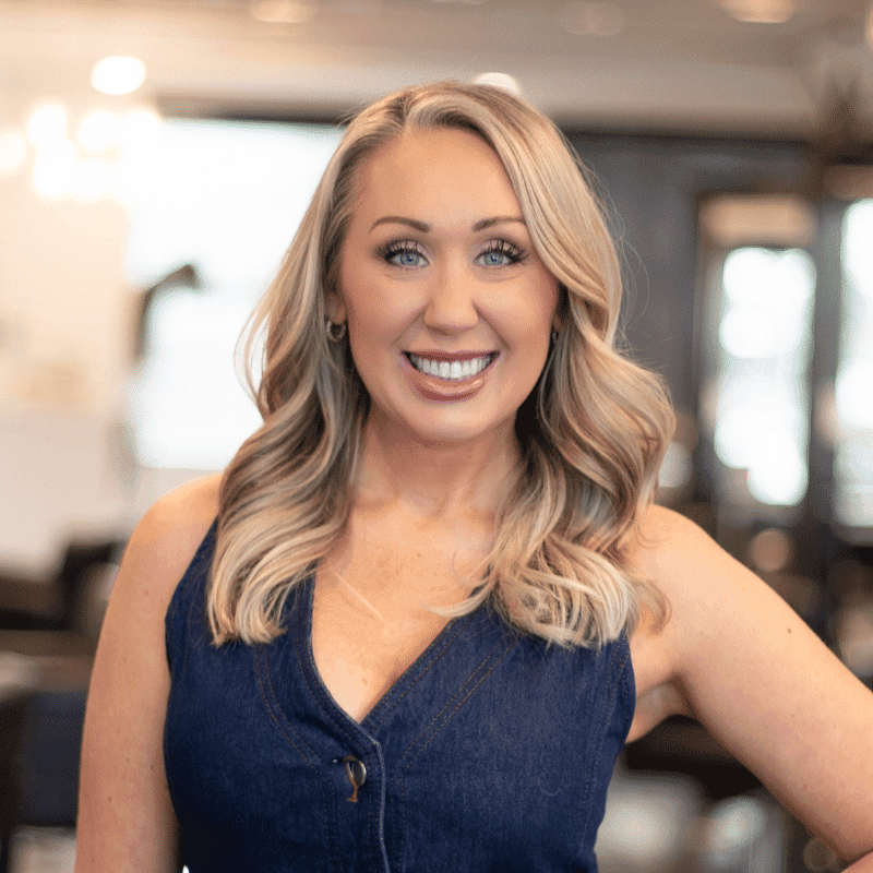 Portrait of Kayleigh, a professional stylist at Brassfields Salon and Day Spa, showcasing their expertise and style.