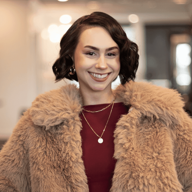 Portrait of Aireonna, a professional stylist at Brassfields Salon and Day Spa, showcasing their expertise and style.