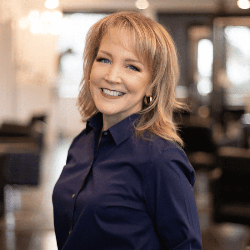 Portrait of Rachel, a professional stylist at Brassfields Salon and Day Spa, showcasing their expertise and style.