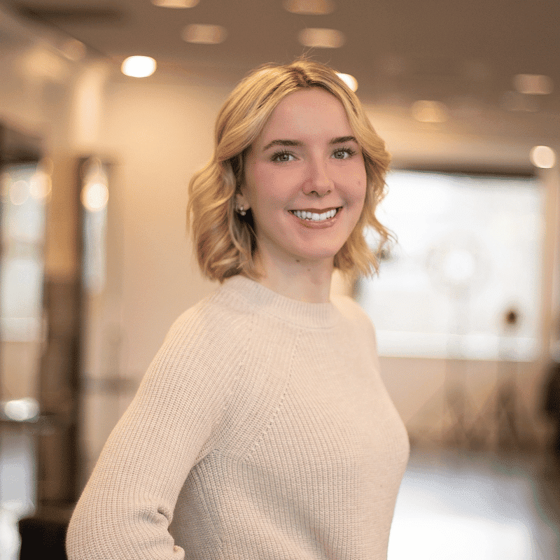 Portrait of Brook, a professional stylist at Brassfields Salon and Day Spa, showcasing their expertise and style.