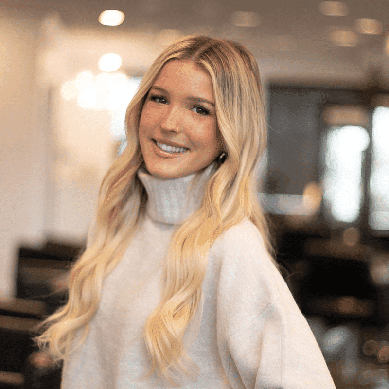 Portrait of Lexi, a professional stylist at Brassfields Salon and Day Spa, showcasing their expertise and style.