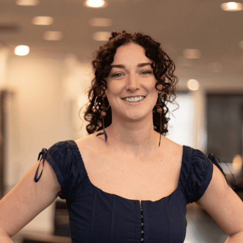 Portrait of Julie, a professional stylist at Brassfields Salon and Day Spa, showcasing their expertise and style.