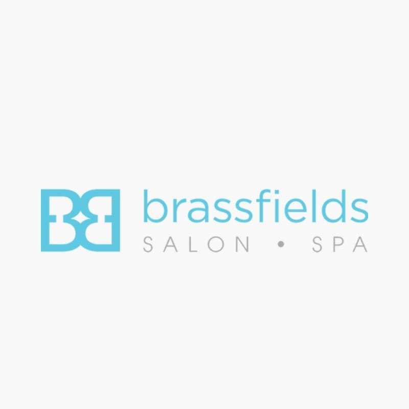 Portrait of Molly, a professional stylist at Brassfields Salon and Day Spa, showcasing their expertise and style.