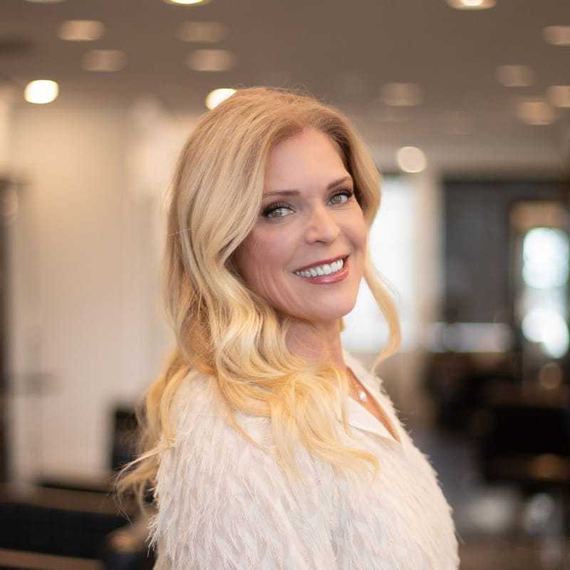 Portrait of Annie, a professional stylist at Brassfields Salon and Day Spa, showcasing their expertise and style.