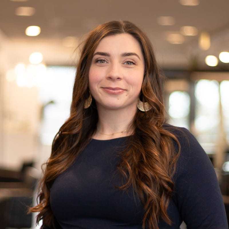 Portrait of Amanda, a professional stylist at Brassfields Salon and Day Spa, showcasing their expertise and style.